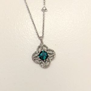 EUC sterling silver green stone filigree pendant